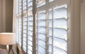 plantation shutters and curtains