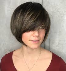 Short blonde pixie cut with black undercut. 12 Amazing Brown Highlights On Black Hair Looks To Rock Wetellyouhow