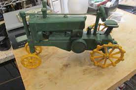 very large cast iron toy tractor