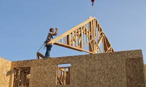 how far can a roof truss span without