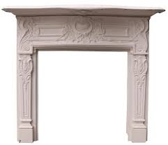 An Antique English Cast Iron Fireplace