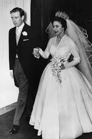 In reflection of this, she chose to wear a white satin court train, bordered with orange blossom, instead of the crimson velvet robe of state. White Wedding Dress The History Of The Most Popular Bridal Gown British Vogue