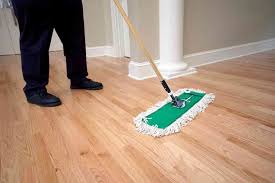 to clean drywall dust off wood floors