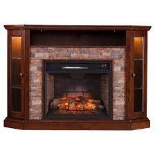 A corner electric fireplace can be a great purchase if you're looking to combine an electric fireplace into a storage unit that may also be used as a tv stand. Ignite The Heart With The Aiden Lane Reza Corner Convertible Infrared Fireplace Media Electric Fireplace Tv Stand Fireplace Tv Stand Corner Electric Fireplace