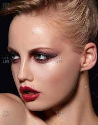 model poses in dramatic makeup stock