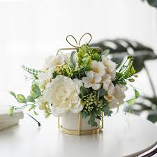 vase room decor potted flowers table