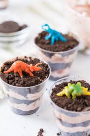The perfect dessert for an easter egg hunt or any easter gathering! Dinosaur Dirt Cups Made To Be A Momma