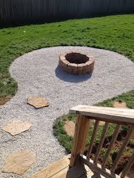 Make sure that every row of blocks are systematically aligned. My Backyard Firepit With Seating Area Stones From Lowes 2 25 A Piece Need 30 And 2 Bags Of Pea Grav Fire Pit Landscaping Backyard Fire Backyard Firepit Area