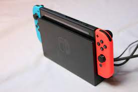 nintendo switch in docking station on
