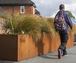 Tall planters to reflect your style and inspire your outdoor space. Bespoke Corten Steel Planters Iota Esi External Works