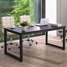 What should you consider when buying desks? Amazon Com Modern Computer Desk 63 Large Office Desk Writing Study Table For Home Office Wide Metal Sturdy Frame Thicker Steel Legs Black Kitchen Dining