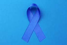 blue ribbon on color background colon