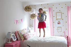 girl s room decorated in pink gold