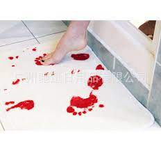a blood footprint bath mat