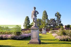 Statue Of Adonis In Stock Photo By