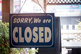 Sorry We Are Closed Sign Hanging On The Door Photo Premium