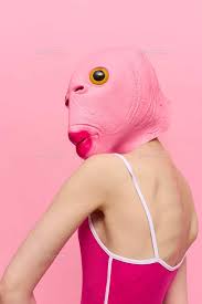 pink halloween costume with a fish head