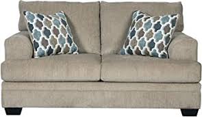 From couches, bedding, and chairs to rugs and accent decor, ashley homestore has tons of unique items for both ashley furniture does not offer any teacher or corporate discounts. Amazon Com Signature Design By Ashley Dorsten Contemporary Loveseat W 2 Accent Pillows Beige Furniture Decor
