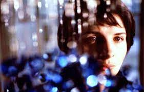The movie's focus shifts abruptly to a glossy blue lollipop wrapper held from the car's window by the hand of a small child. Into The Blue Kieslowski S Three Colours Blue Film Hysteria