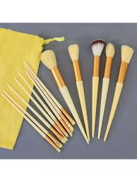 yellow makeup brushes