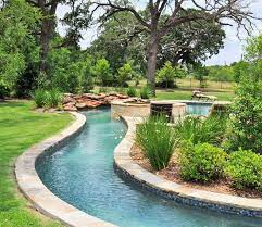 You can build a backyard lazy river just like those in the most exclusive resorts all around the world or even the local water park. College Station Pool Water Features Photo Gallery Brazos Valley Backyard Pool Pool Water Features Lazy River Pool