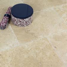 ivory travertine tumbled unfilled tile