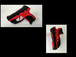 red ruger lc9 9mm handgun with viridian