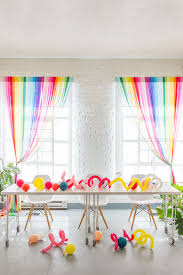 I was inspired to make this after our balloon wall a few weeks ago. Diy Rainbow Streamer Curtains Parties Diy Party Decorations Rainbow Party Decorations Rainbow Invitations