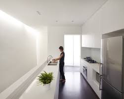 Minimalist kitchens are cool because they can also be easily integrated with the living space. Kitchen Design Idea White Modern And Minimalist Cabinets