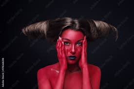dark background devil makeup fashion