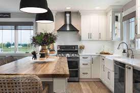 white cabinets and black appliances