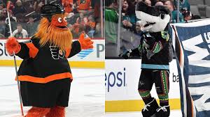 He is a large bald eagle who wears the number 00. Gritty S J Sharkie Headline Nhl Mascot Showdown At All Star Game