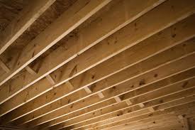 and groove pine on a ceiling joist