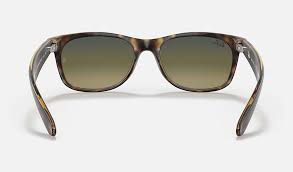 These sunglasses in matte havana tortoise with crystal blue green gradient polarized lenses give you glare protection from every direction. Ray Ban New Wayfarer Classic Rb2132 Tortoise Nylon Blue Green Polarized Lenses 0rb2132894 7652 Ray Ban Usa