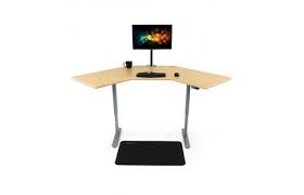 Manual standing desks, on the other hand, have different kinds of cranks to put the table into a higher position. Imovr Thermodesk Energize Corner Standing Desk Standing Health