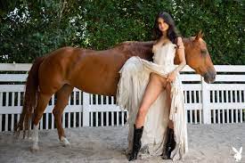 Gorgeous pornstar Eliza Ibarra is naked bride riding a horse 10 photos