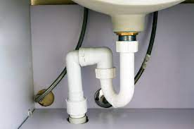 fix a leaking pipe under bathroom sink