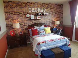 Boys bedroom ideas such as themes for a toddler boy bedroom, storage solutions can help you design the perfect space for a growing young man. The Howard Bunch April 2012 Brick Wallpaper Bedroom Brick Wall Bedroom Bedroom Decor