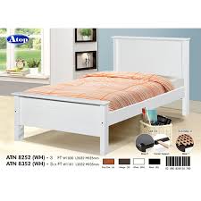 wooden bed bed