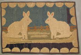 pa hooked rug with seated rabbits