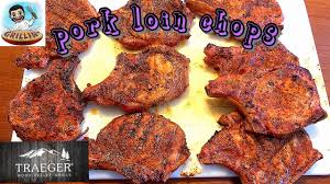 pork chops on a traeger grill smoke