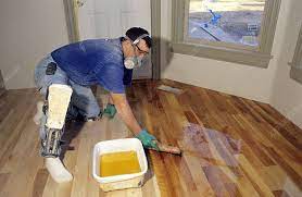 sealing a hardwood floor stock image