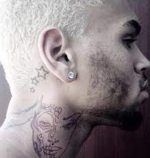 Not only chris brown tattoo rihanna, you could also find another pics such as chris brown beats rihanna, chris brown with rihanna, chris brown vs. Chris Brown Shows Off Neck Tattoo Of Beaten Woman With Striking Resemblance To Rihanna