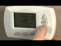 program a programmable thermostat