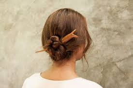 Place the hairpins all around your bun, going through it and into the base of your hair. How To Use A Hair Stick Hair Sticks Hair Forks Tutorial