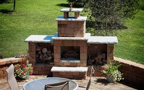 Outdoor sectional licensed contractor matt blashaw and his yard crasher crew helped to build this fire pit which sets on a stained redwood deck with a privacy wall. Outdoor Fireplace Ideas The Home Depot