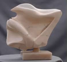 Alabaster is a stone, generally white with shadow markings in it. Alabaster Stone Sculpture