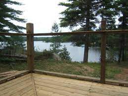 Wood And Glass Deck And Railing