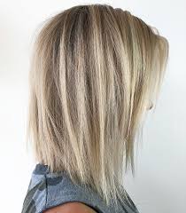 This stunning haircut with subtle honey highlights and discreet layers looks for the best hairstyles for ladies above 50 who have a special event to attend, bringing in major lowlights and who said that hairstyles for women over 50 could not include mermaid hair? 50 No Fail Medium Length Hairstyles For Thin Hair Hair Adviser