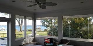 How do you convert a screened-in porch to a sunroom?